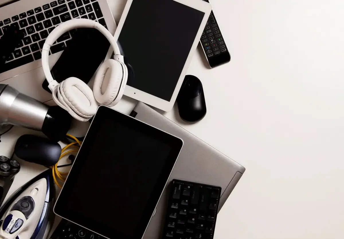 A group of electronics lying across a flat surface.