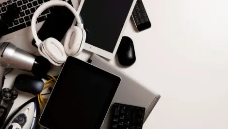 A group of electronics lying across a flat surface.