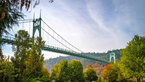 A view of St. John's Bridge over the Willamette River from Cathedral City Park in Portland, OR.