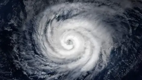 A satellite image of a hurricane over the ocean.